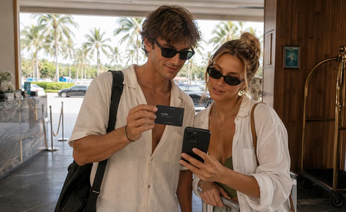 Two travellers checking Card Phu Quoc on their phones